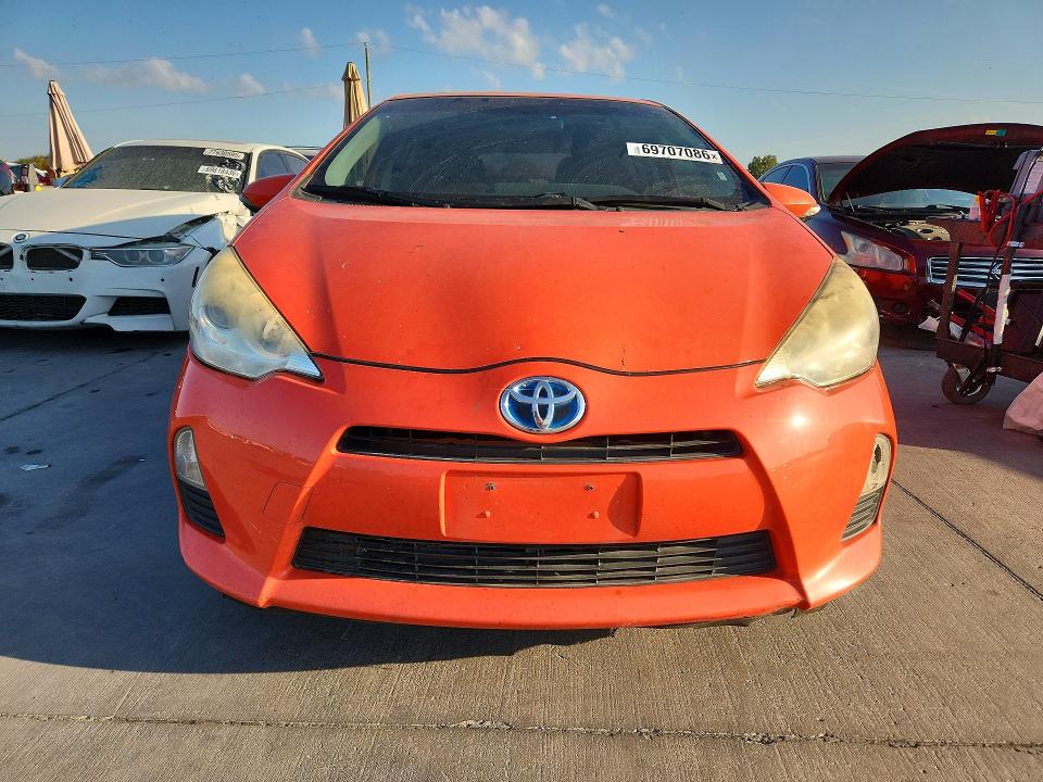Photo 5 from auction – 2014 TOYOTA PRIUS C with VIN JTDKDTB35E1079995