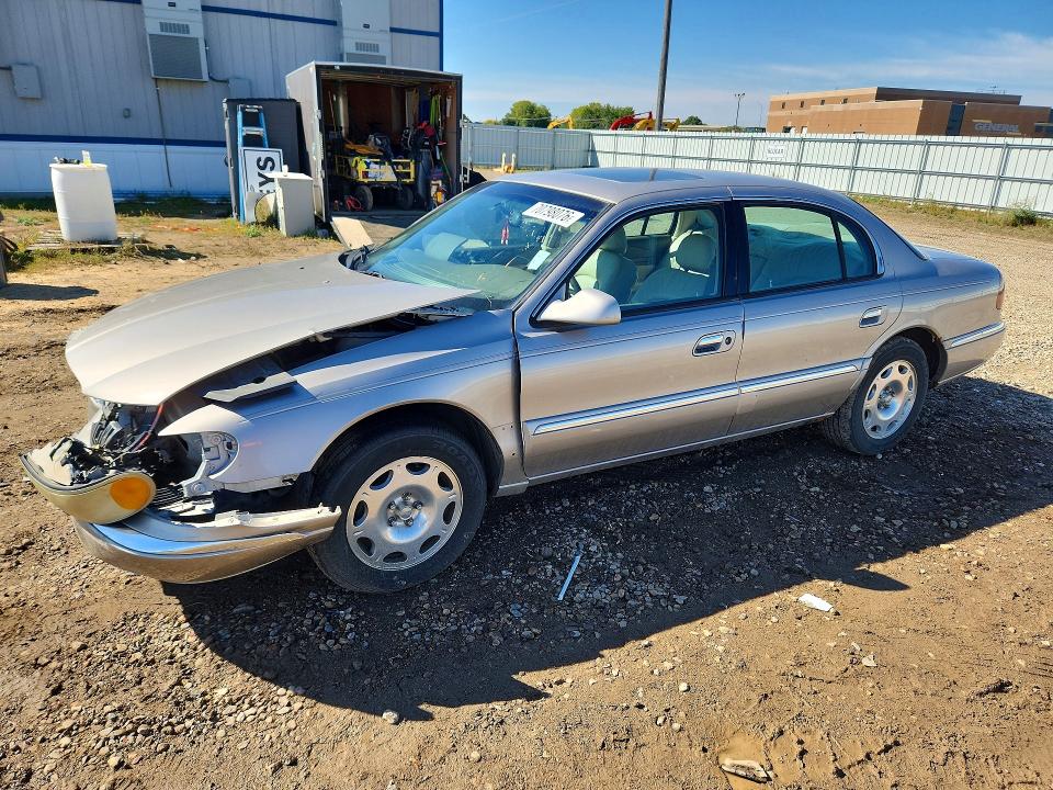 LINCOLN CONTINENTAL 2002 with VIN 1LNHM97V42Y700665 - Photo from auction