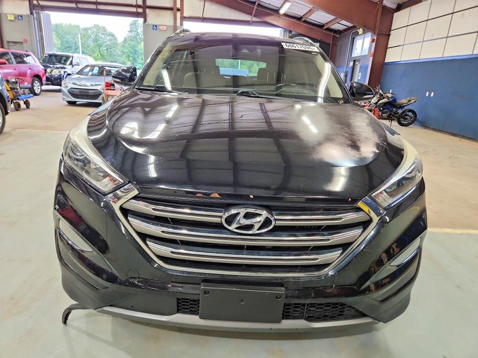 Photo 5 from auction – 2016 HYUNDAI TUCSON with VIN KM8J3CA26GU236311