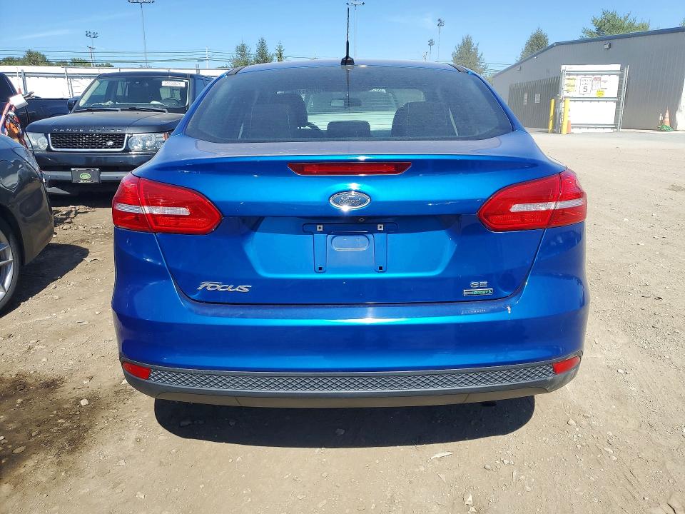 Снимка 6 от търг – 2018 FORD FOCUS с VIN 1FADP3FE7JL255364