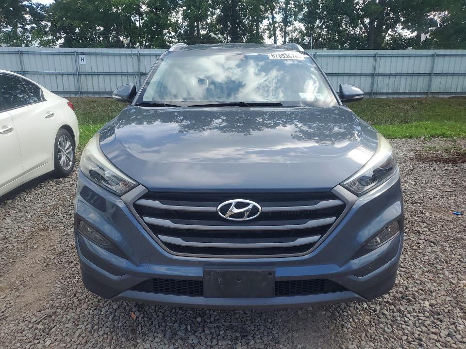 Photo 5 from auction – 2016 HYUNDAI TUCSON with VIN KM8J3CA25GU049142