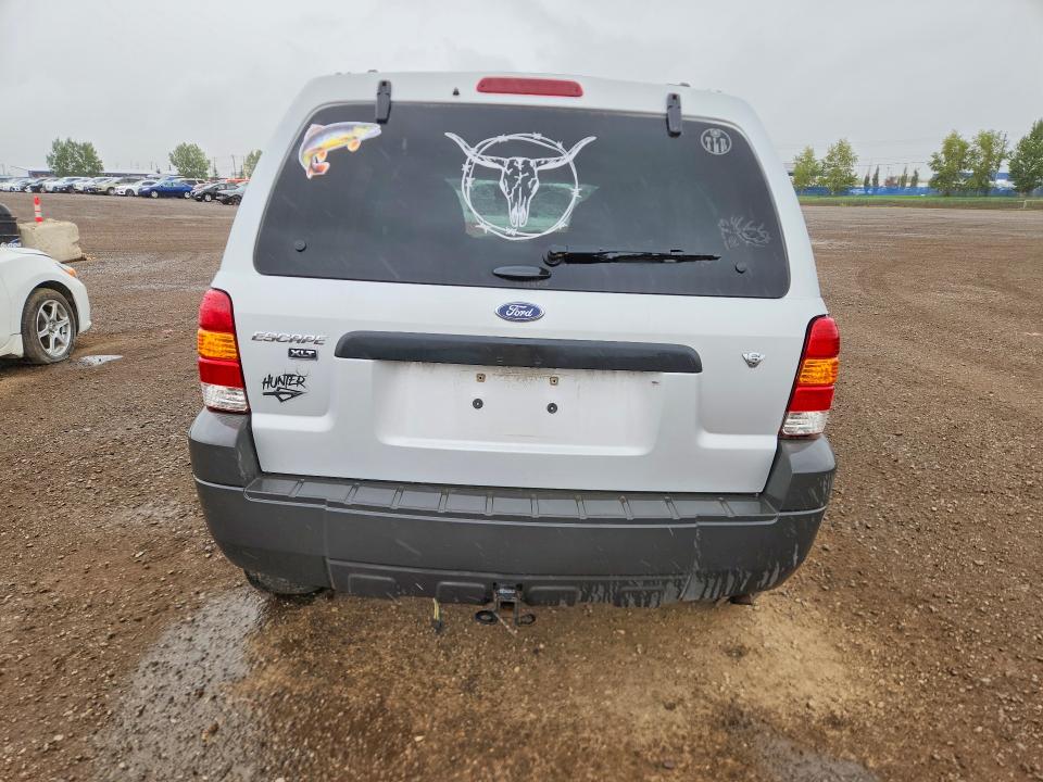 Photo 6 from auction – 2005 FORD ESCAPE with VIN 1FMYU931X5KE06875