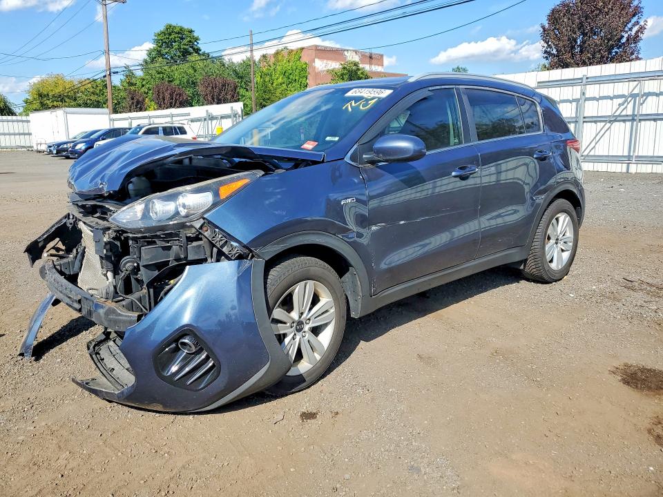 KIA SPORTAGE 2018 with VIN KNDPMCAC4J7355646 - Photo from auction