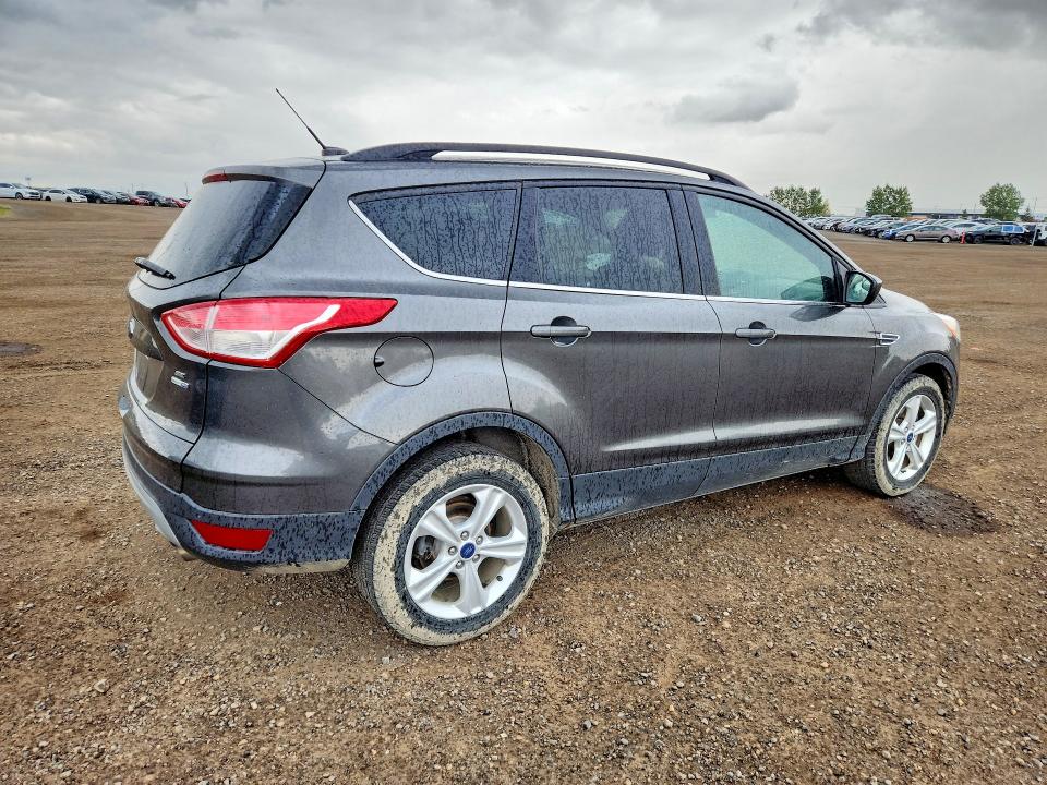 Photo 3 from auction – 2015 FORD ESCAPE with VIN 1FMCU9GX5FUC50680