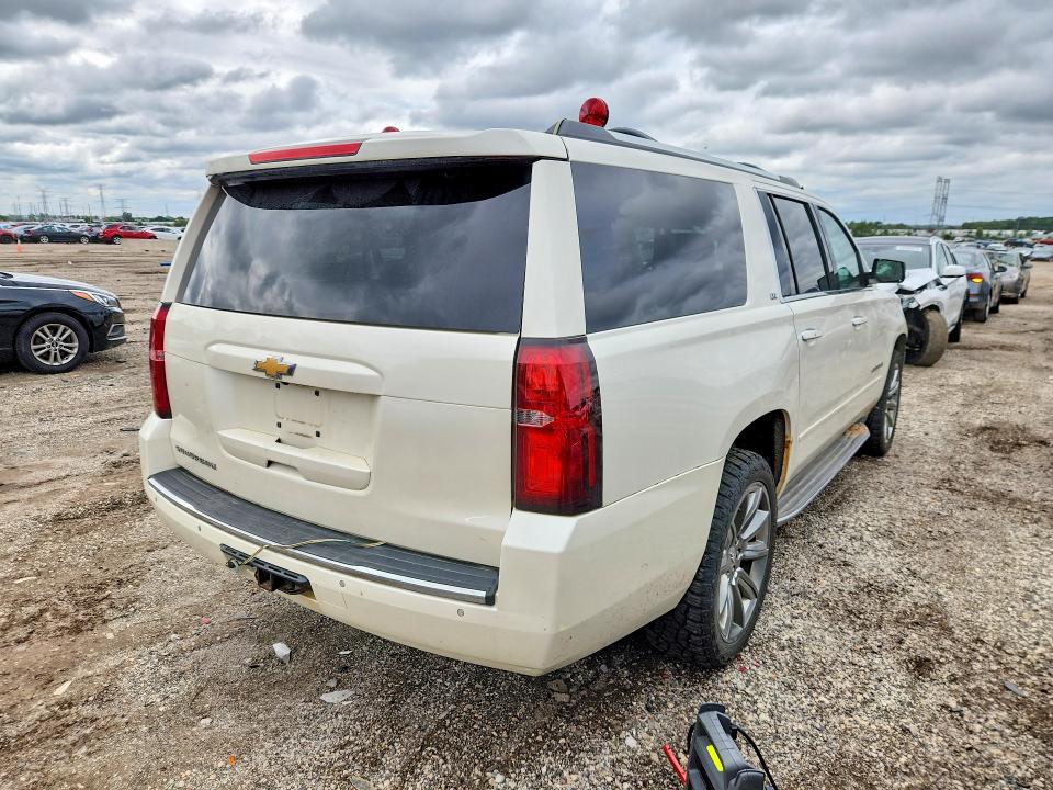 Photo 3 from auction – 2015 CHEVROLET SUBURBAN with VIN 1GNSKKKC9FR239449