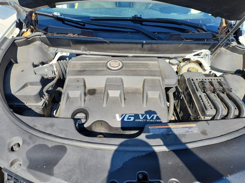 Снимка 12 от търг – 2014 CADILLAC SRX с VIN 3GYFNDE32ES681276