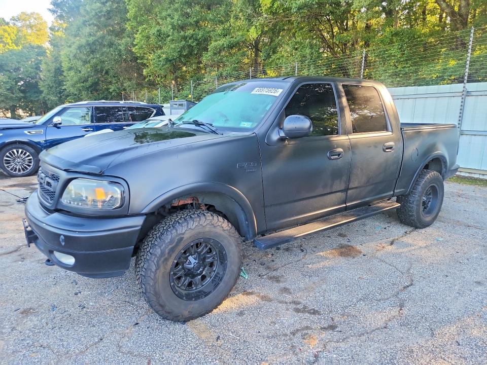 FORD F150 2003 with VIN 1FTRW08L33KD16912 - Photo from auction