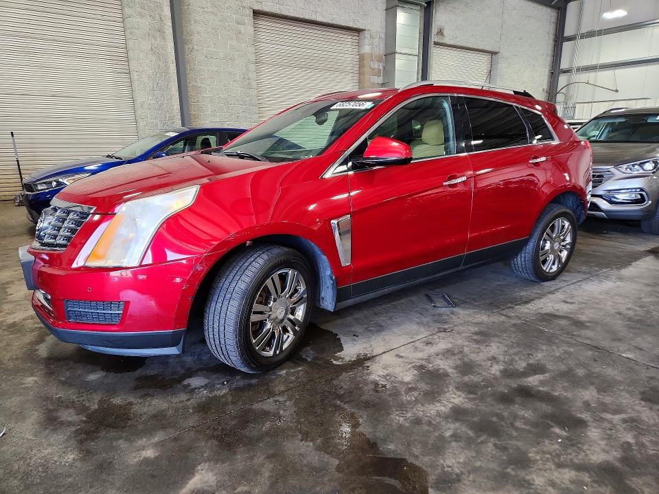 CADILLAC SRX 2014 with VIN 3GYFNEE36ES581090 - Photo from auction