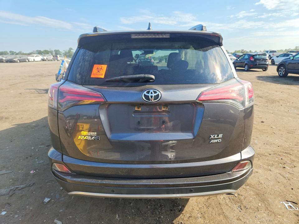 Photo 6 from auction – 2018 TOYOTA RAV4 with VIN JTMRFREV2JJ196842