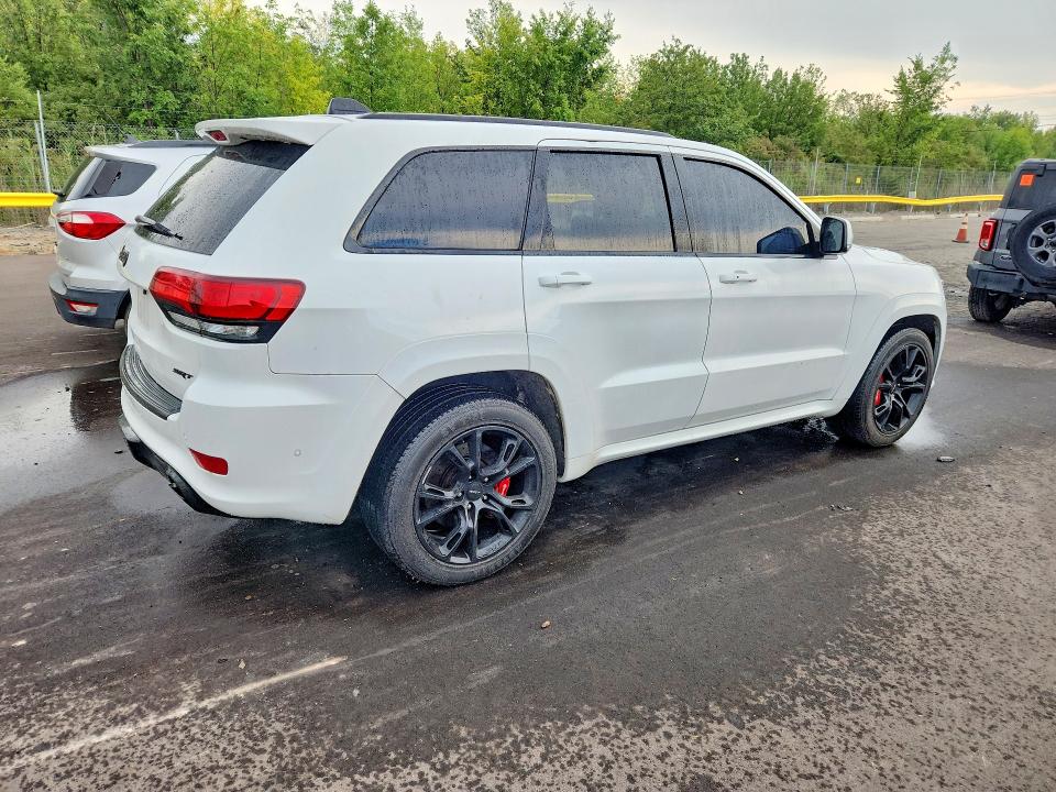 Photo 3 from auction – 2014 JEEP GRAND CHEROKEE with VIN 1C4RJFDJ5EC395258