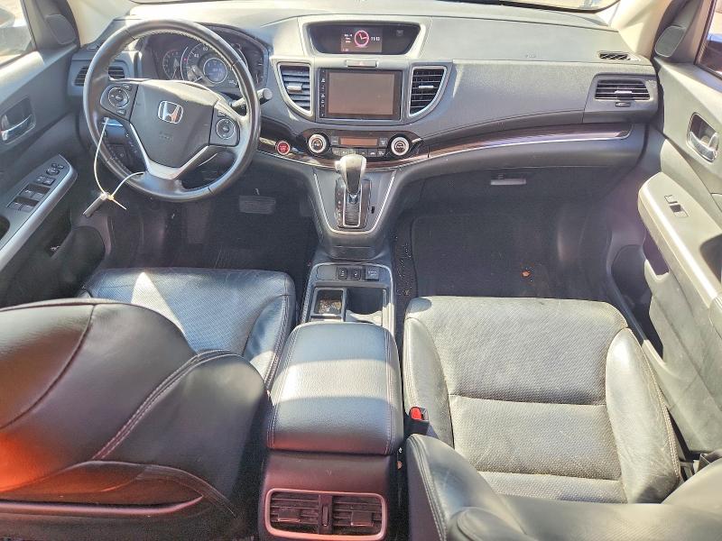 Photo 8 from auction – 2016 HONDA CR-V with VIN 2HKRM4H71GH713670