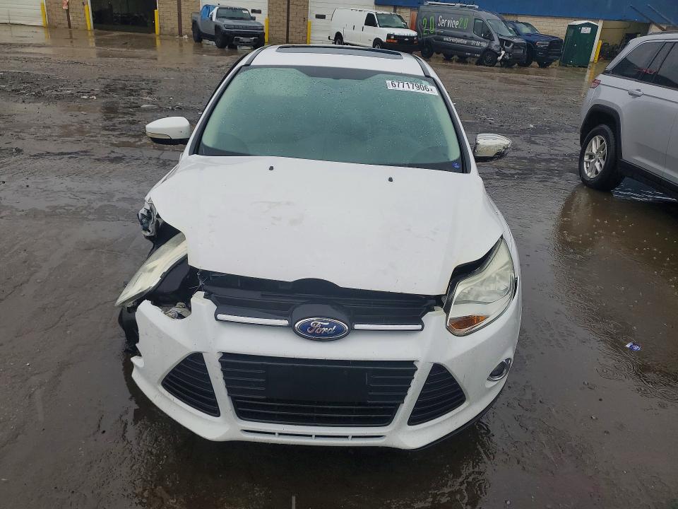 Photo 5 from auction – 2012 FORD FOCUS with VIN 1FAHP3F29CL284018