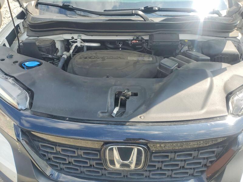 Photo 7 from auction – 2020 HONDA PASSPORT with VIN 5FNYF7H55LB001158