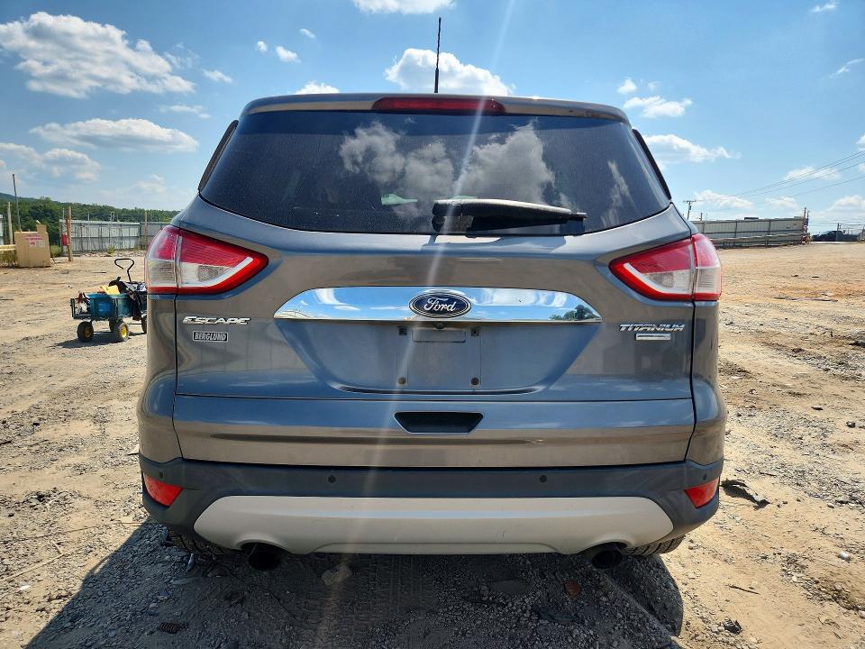 Снимка 6 от търг – 2014 FORD ESCAPE с VIN 1FMCU9J91EUE57821