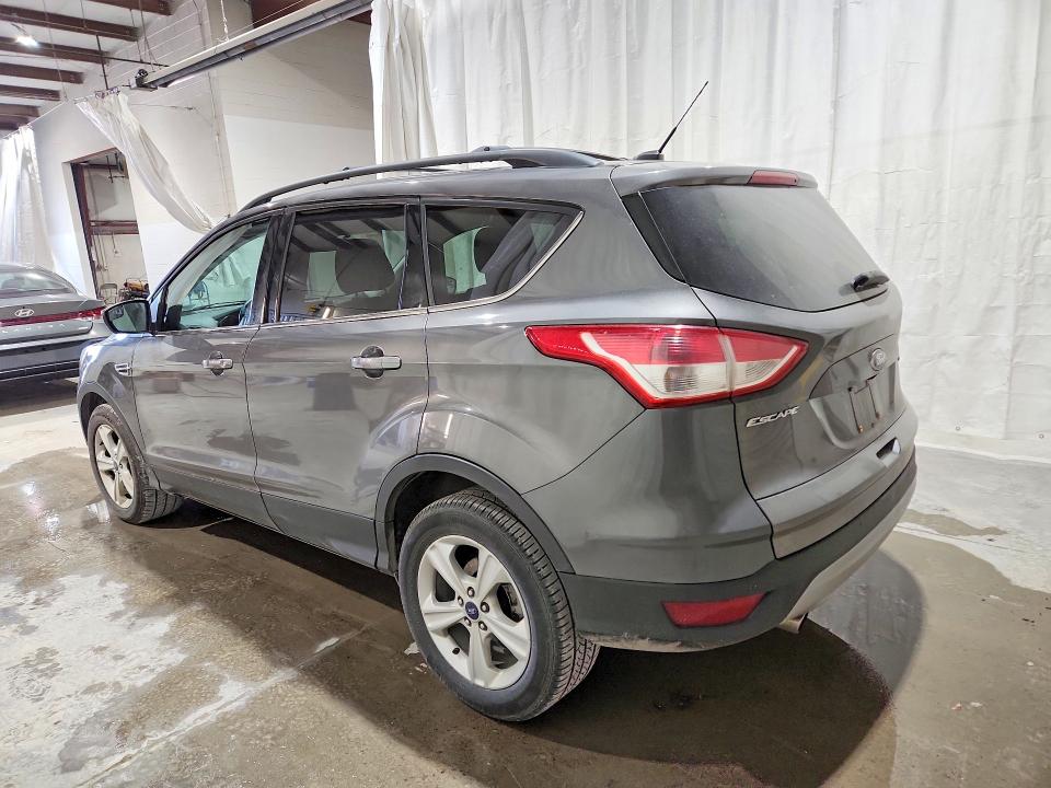 Photo 2 from auction – 2014 FORD ESCAPE with VIN 1FMCU9GX0EUB04170