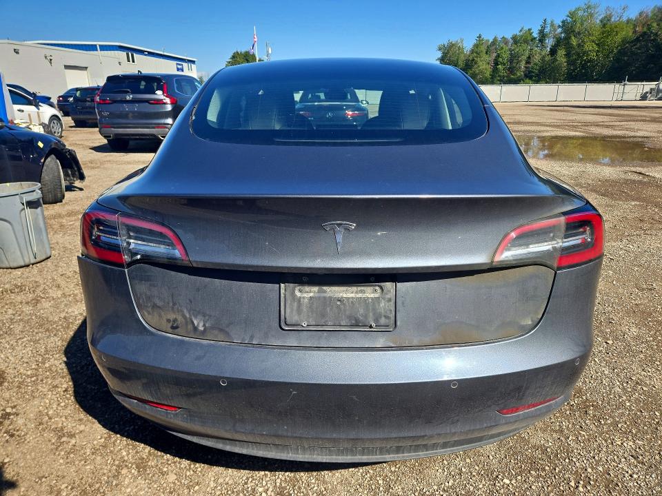 Photo 6 from auction – 2022 TESLA MODEL 3 with VIN 5YJ3E1EA4NF317813