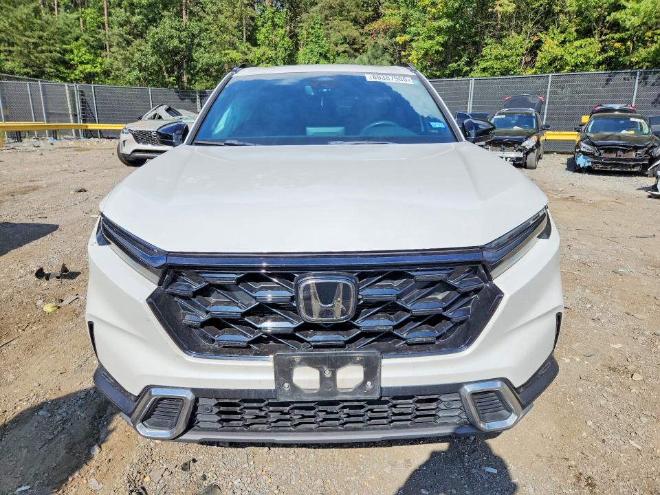 Photo 5 from auction – 2023 HONDA CR-V with VIN 2HKRS6H97PH806020