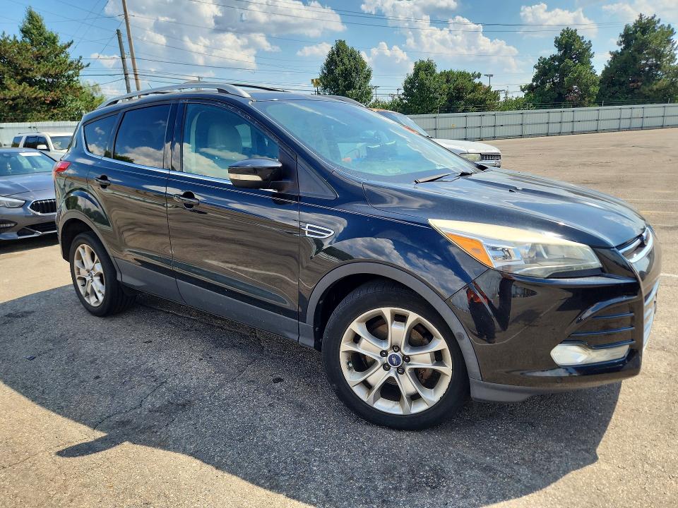 Photo 4 from auction – 2014 FORD ESCAPE with VIN 1FMCU0JX6EUB13959