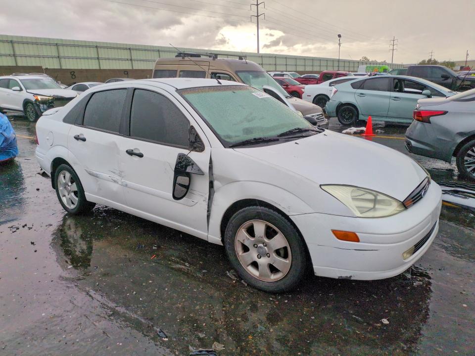 Photo 4 from auction – 2001 FORD FOCUS with VIN 1FAFP38371W209570
