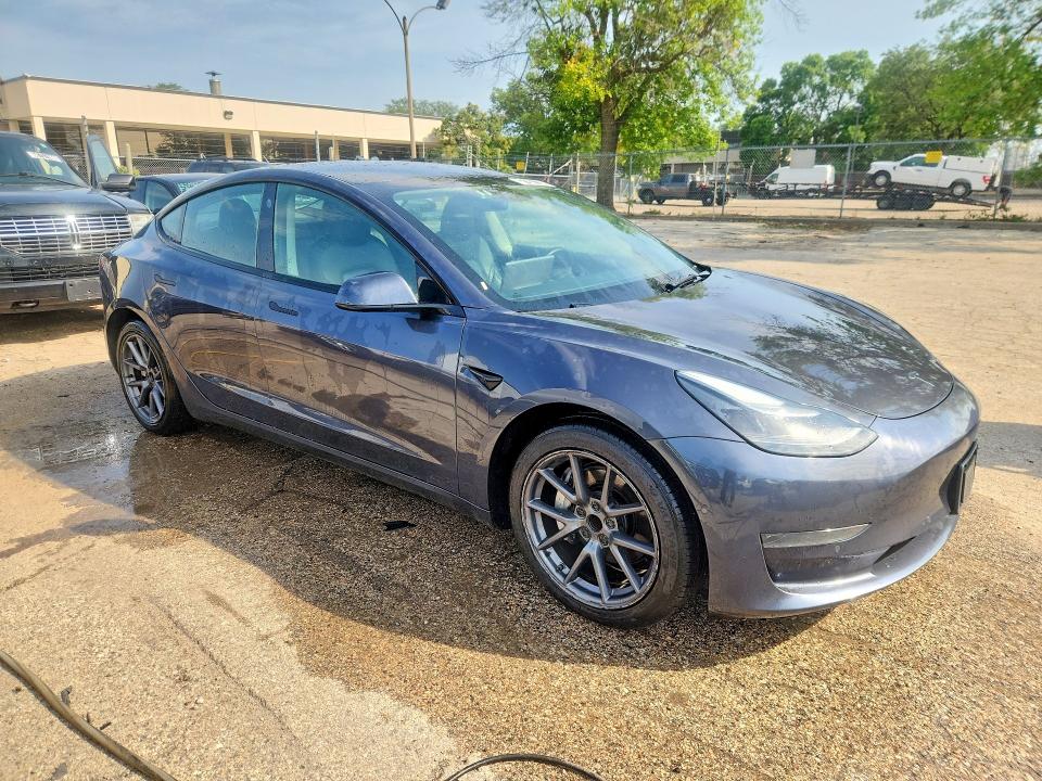 Photo 4 from auction – 2022 TESLA MODEL 3 with VIN 5YJ3E1EA6NF370996