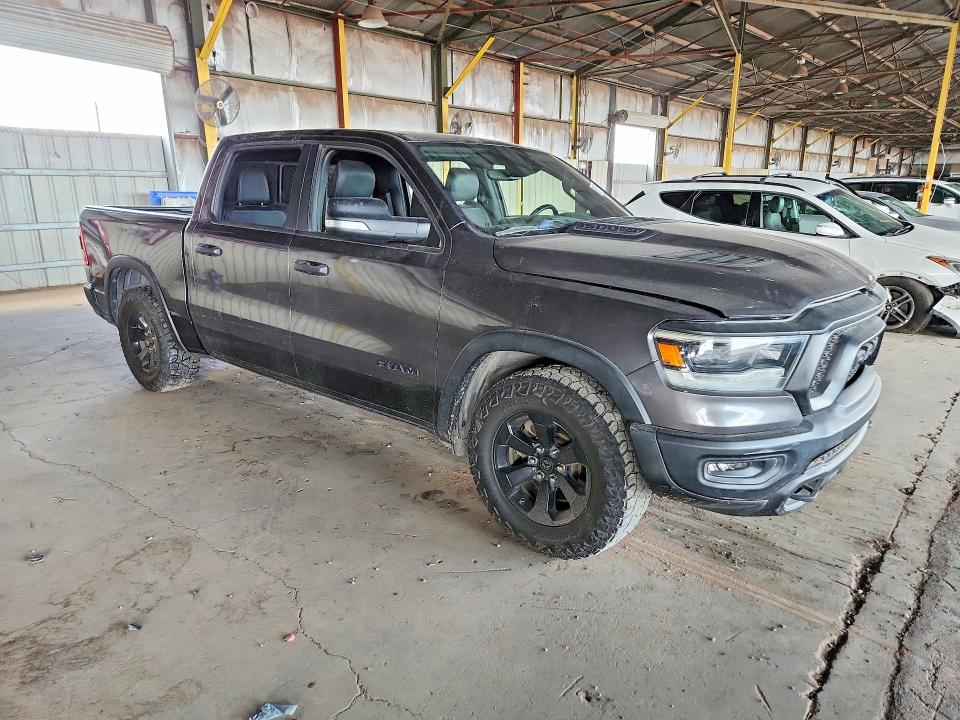 Снимка 4 от търг – 2021 RAM 1500 с VIN 1C6SRFLT9MN571722