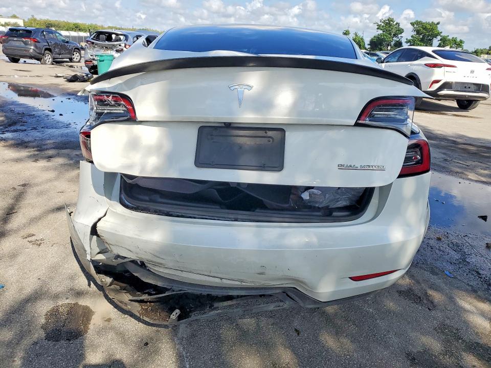 Снимка 6 от търг – 2023 TESLA MODEL 3 с VIN 5YJ3E1EC8PF499813