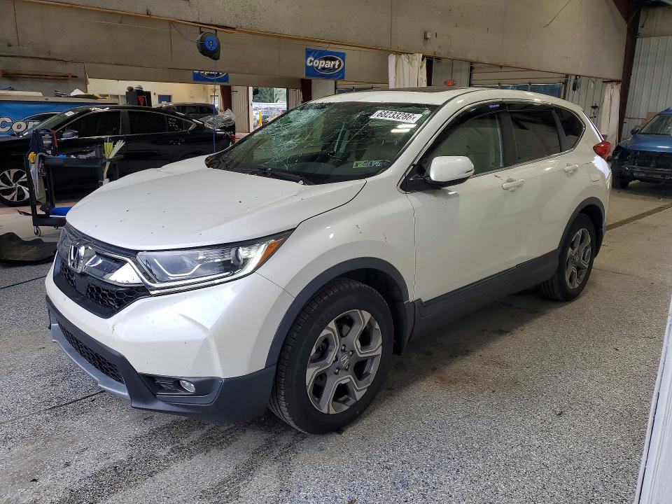 Photo 1 from auction – 2018 HONDA CR-V with VIN 2HKRW2H83JH602911
