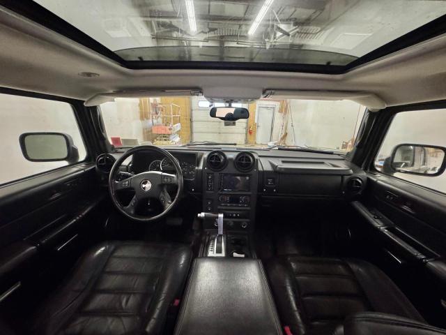 Photo 9 from auction – 2006 HUMMER H2 with VIN 5GRGN23U36H107725