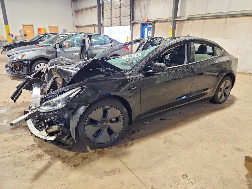 TESLA MODEL 3 2023 с VIN 5YJ3E1EA1PF556433 - Снимка от търг