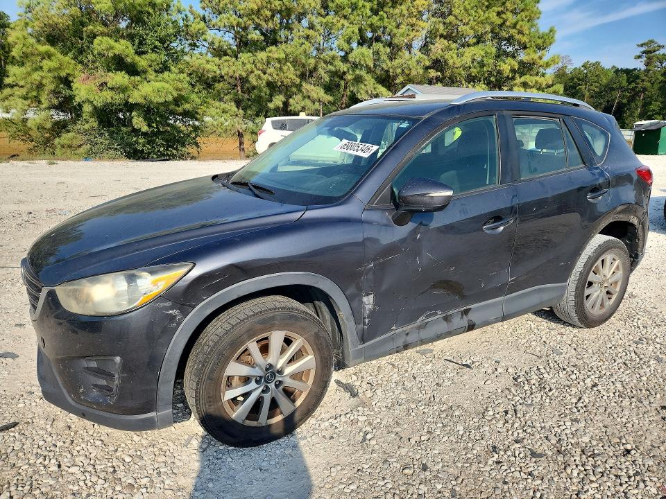 MAZDA CX-5 2016 с VIN JM3KE2BY6G0634844 - Снимка от търг