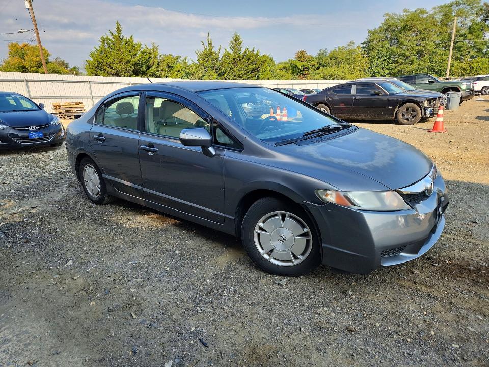 Снимка 4 от търг – 2010 HONDA CIVIC с VIN JHMFA3F28AS006053