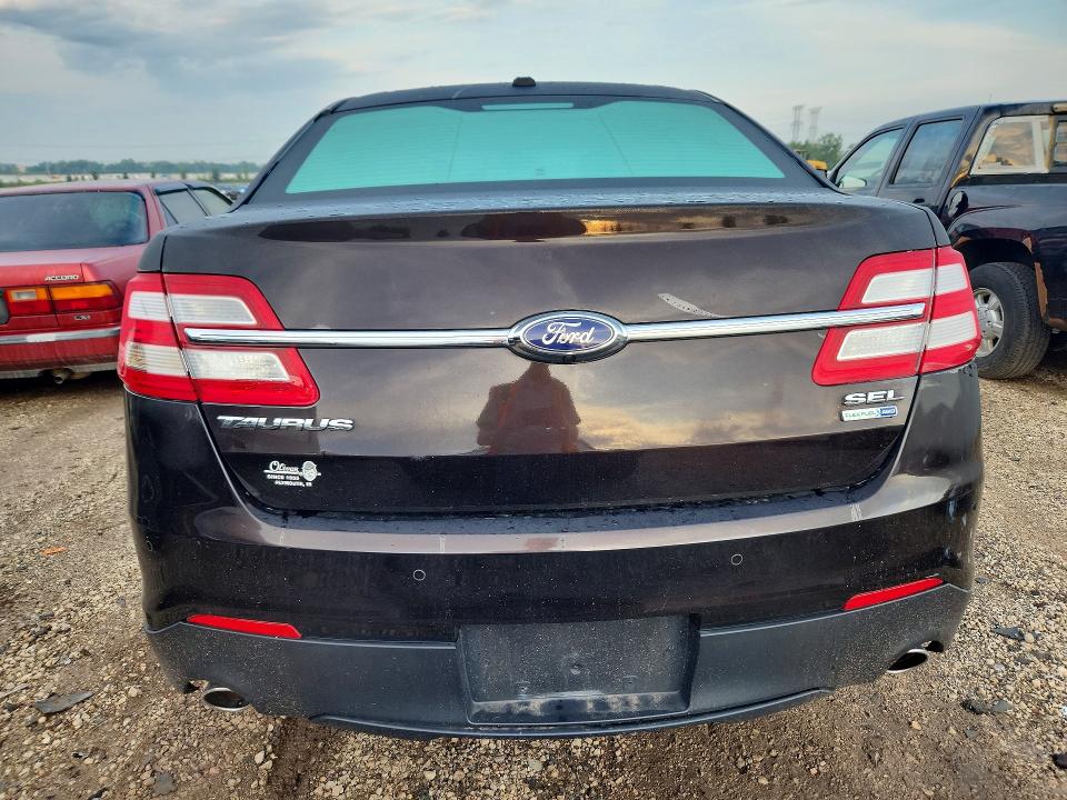 Photo 6 from auction – 2013 FORD TAURUS with VIN 1FAHP2H89DG164001