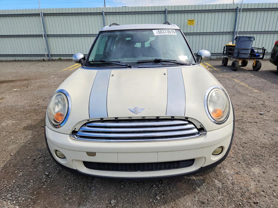 Фото 5 с аукциона – 2010 MINI COOPER с VIN WMWML3C53ATX51981