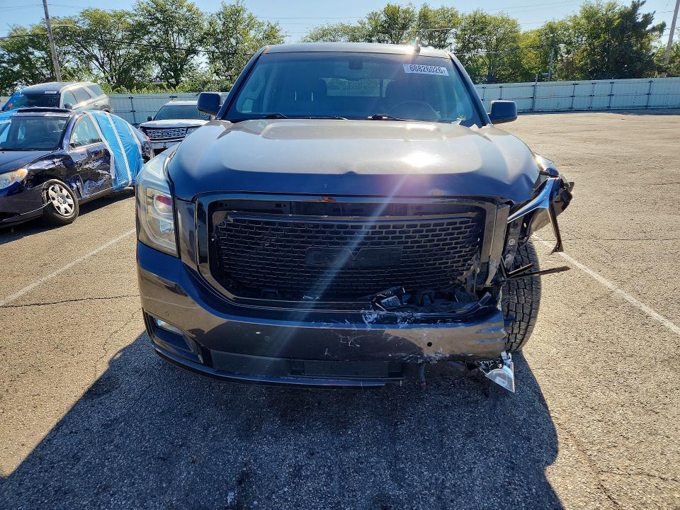 Foto 5 de la subasta – 2016 GMC YUKON con VIN 1GKS2AKC2GR418523