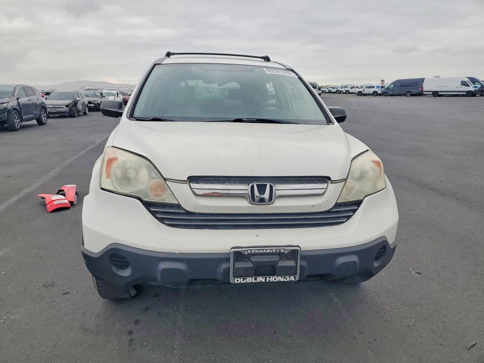 Photo 5 from auction – 2009 HONDA CR-V with VIN 5J6RE38539L032182