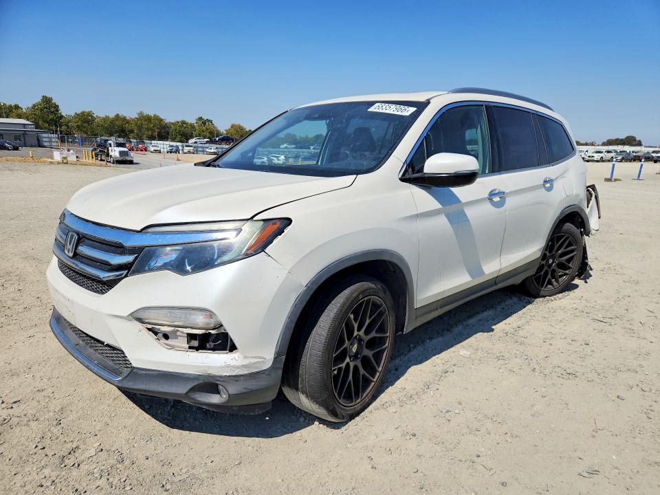 HONDA PILOT 2017 with VIN 5FNYF5H91HB005416 - Photo from auction