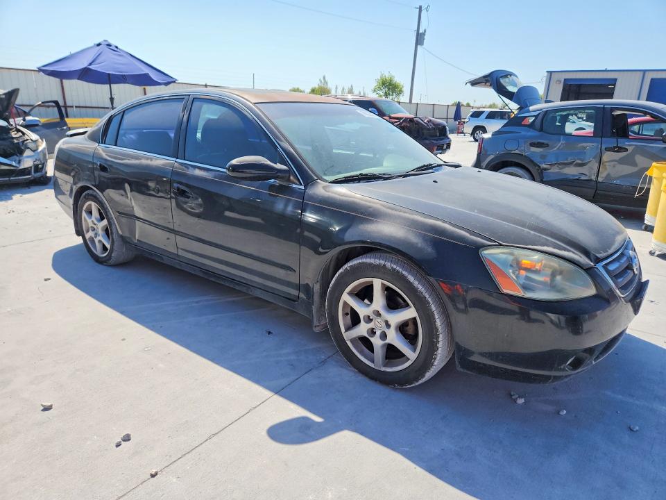 Photo 4 from auction – 2002 NISSAN ALTIMA with VIN 1N4BL11D22C119067