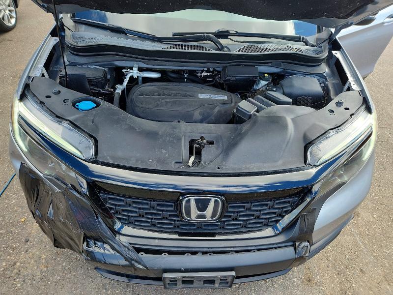 Photo 12 from auction – 2019 HONDA PASSPORT with VIN 5FNYF8H55KB027148