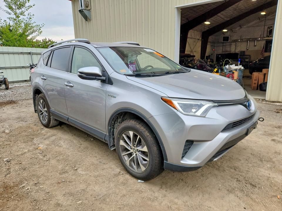 Photo 4 from auction – 2018 TOYT RAV4 with VIN JTMRJREV6JD252696