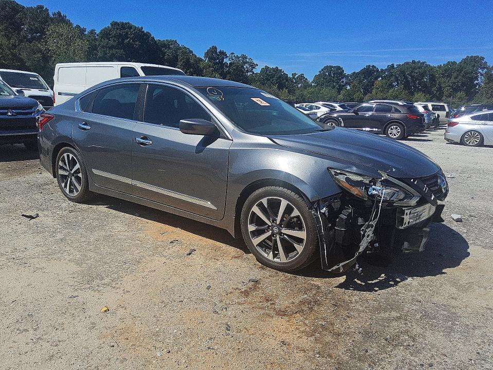 Photo 4 from auction – 2016 NISSAN ALTIMA with VIN 1N4AL3AP9GC169277