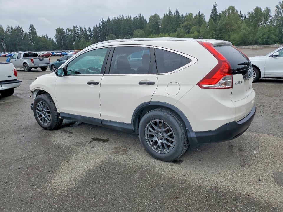 Photo 2 from auction – 2014 HONDA CR-V with VIN 2HKRM3H33EH003531