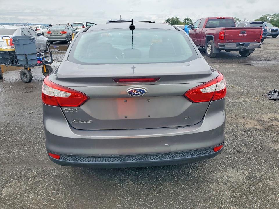 Снимка 6 от търг – 2014 FORD FOCUS с VIN 1FADP3F21EL230908