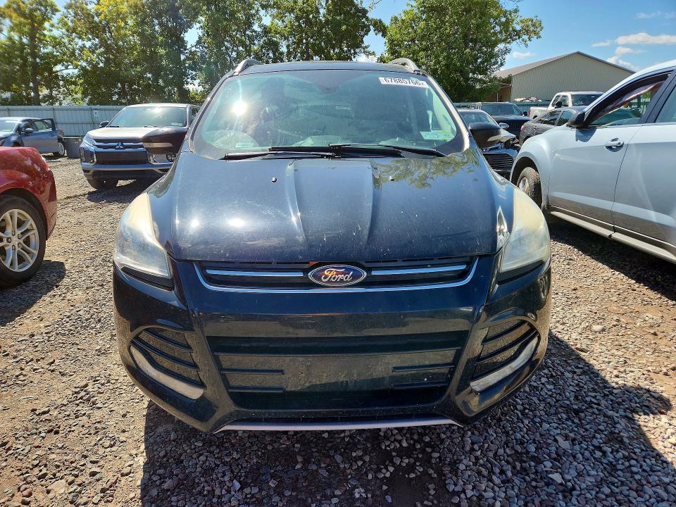 Photo 5 from auction – 2016 FORD ESCAPE with VIN 1FMCU9JXXGUB05239