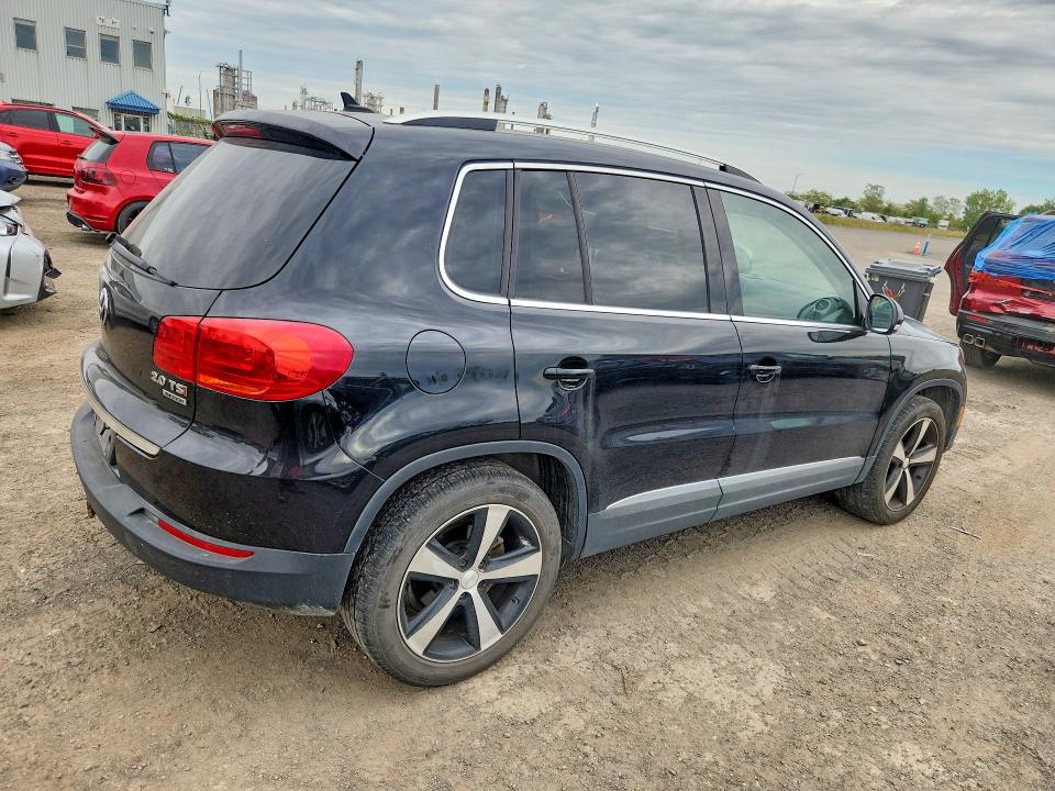Снимка 3 от търг – 2015 VOLKSWAGEN TIGUAN с VIN WVGJV7AX9FW522959