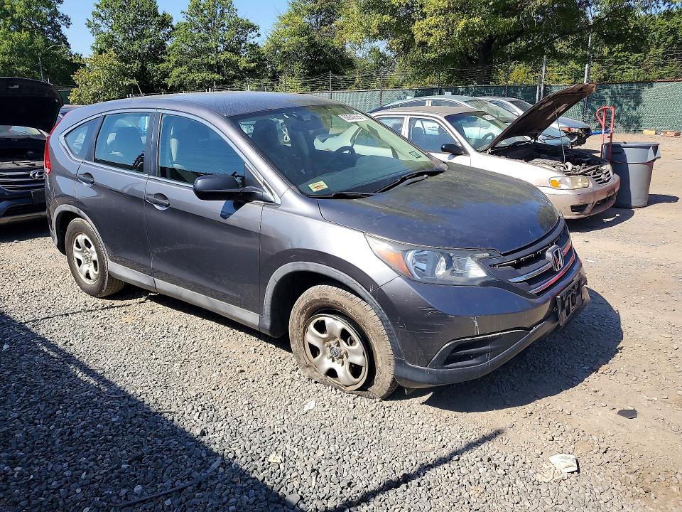 Снимка 4 от търг – 2014 HONDA CR-V с VIN 2HKRM3H33EH504631