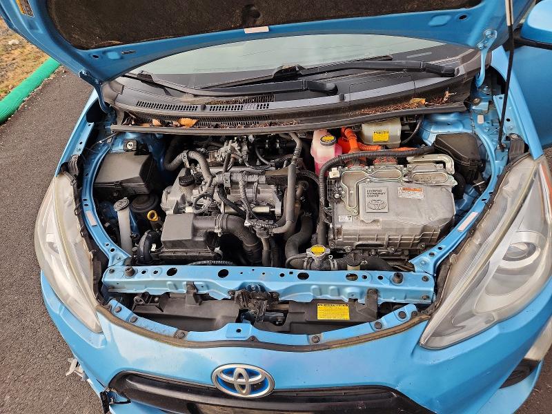 Photo 11 from auction – 2015 TOYOTA PRIUS C with VIN JTDKDTB37F1089722