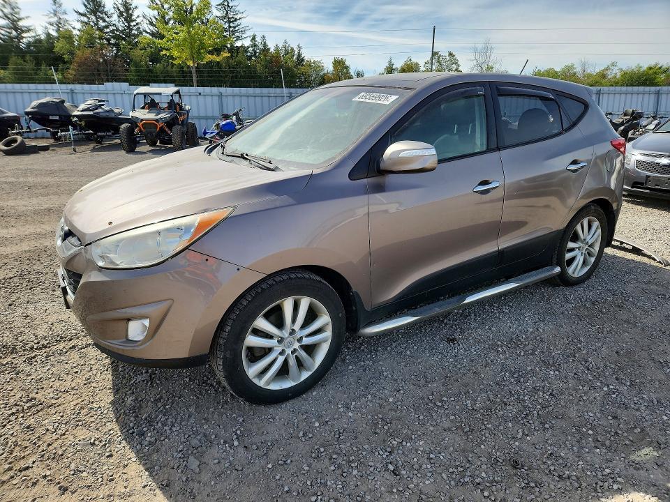 Photo 1 from auction – 2012 HYUNDAI TUCSON with VIN KM8JUCAC6CU474028