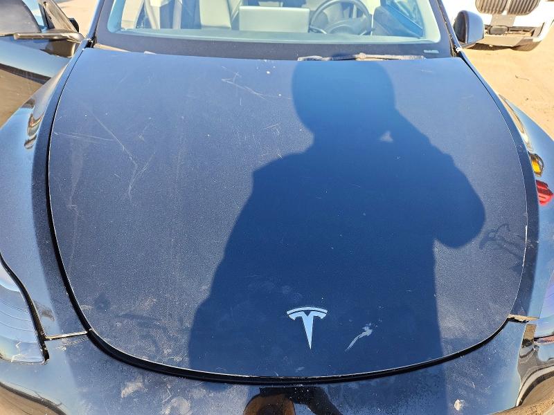 Photo 12 from auction – 2022 TESLA MODEL Y with VIN 7SAYGDEF4NF490568