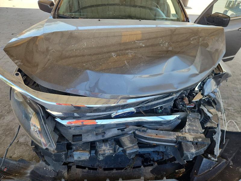 Photo 11 from auction – 2011 FORD FUSION with VIN 3FADP0L35BR161908