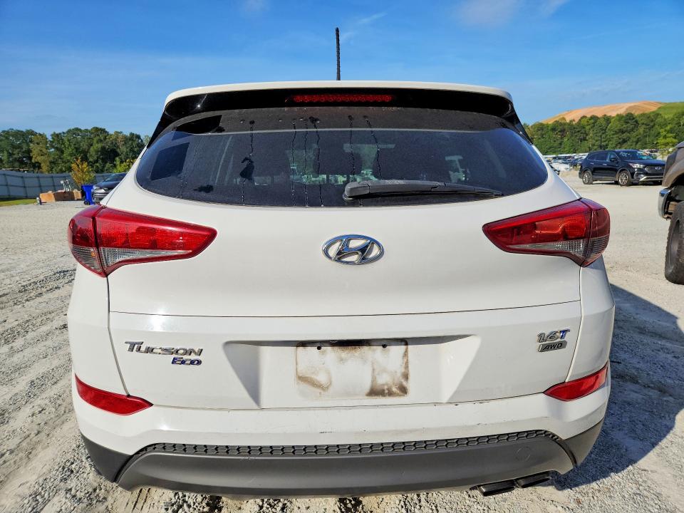 Photo 6 from auction – 2016 HYUNDAI TUCSON with VIN KM8J3CA24GU138927